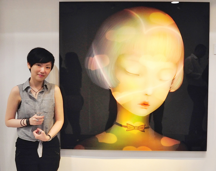 Sonya Fu next to her work "I love" (2014) at AP Contemporary, Hong Kong